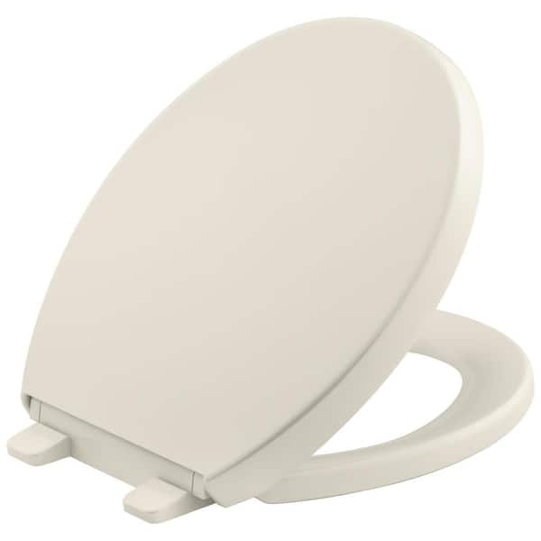 KOHLER Grip Tight Reveal Q3 Round Closed Front Toilet Seat in Biscuit