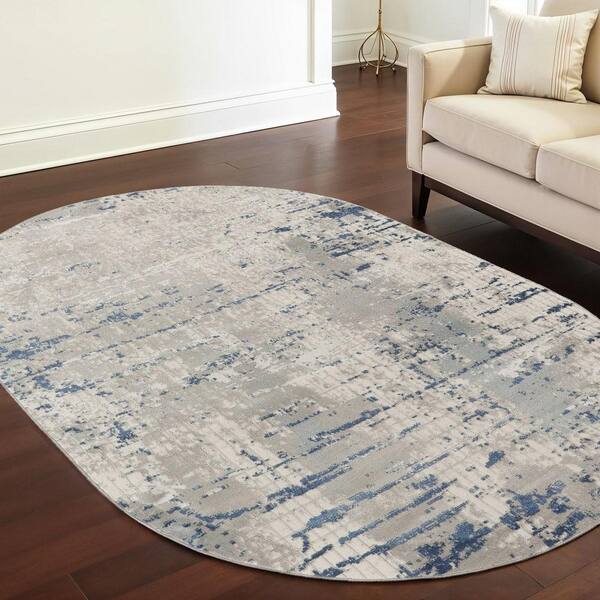 5' X 8' Gray and Ivory Abstract Power Loom Area Rug