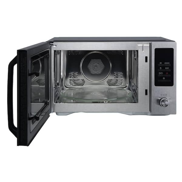 https://images.thdstatic.com/productImages/bdd4889e-e7bb-4eab-b25e-ded38e12a2a8/svn/black-with-stainless-door-magic-chef-countertop-microwaves-mc110amst-c3_600.jpg