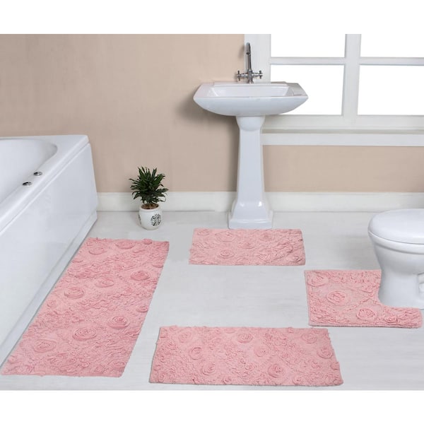 https://images.thdstatic.com/productImages/bddb2369-1010-4344-bb97-22c207ca8d2e/svn/pink-bathroom-rugs-bath-mats-bmo4pc17212021pi-64_600.jpg