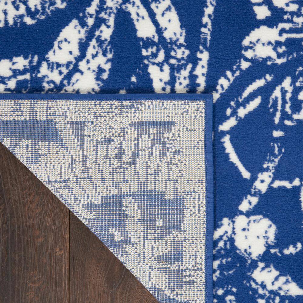 Navy Floral Charm 5' x 7' Synthetic Reversible Area Rug