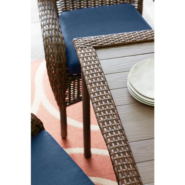 hampton bay cambridge brown wicker outdoor patio dining chair with standard midnight navy blue cushions