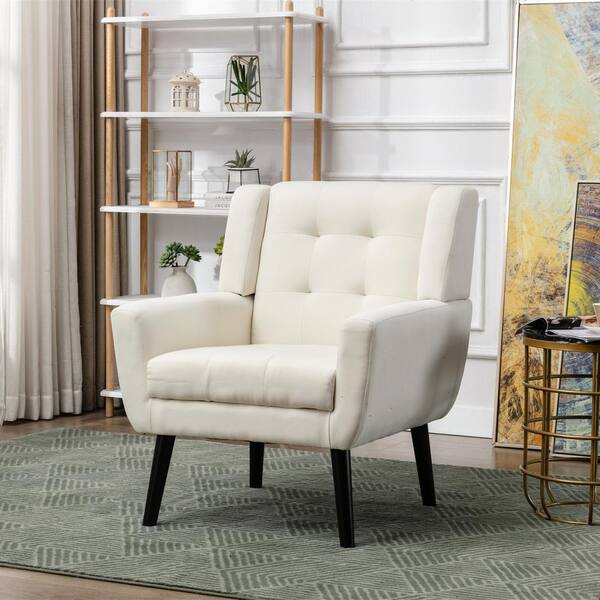 cream armchair black legs