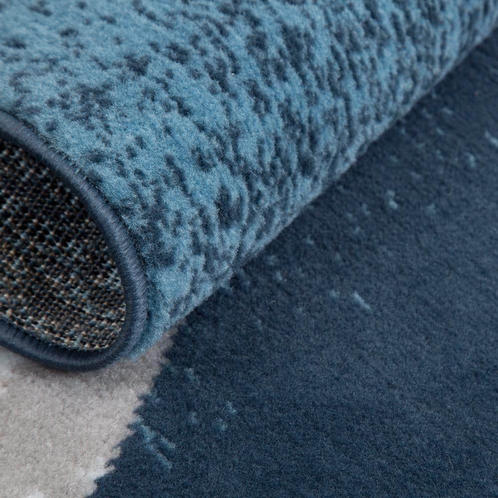 Gray and Blue Geometric 8' x 10' Synthetic Area Rug