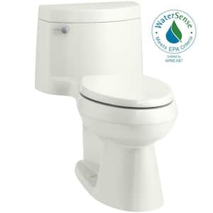 Cimarron 12 in. Rough In 1-Piece 1.28 GPF Single Flush Elongated Toilet in Dune Seat Included