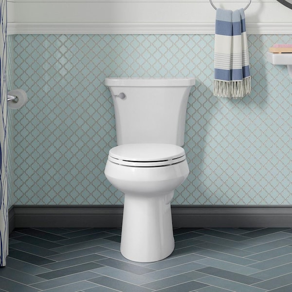 Highline Arc 12 in. Rough In 2-Piece 1.28 GFP Single Flush Round Chair Height Toilet in White with Soft Close Seat