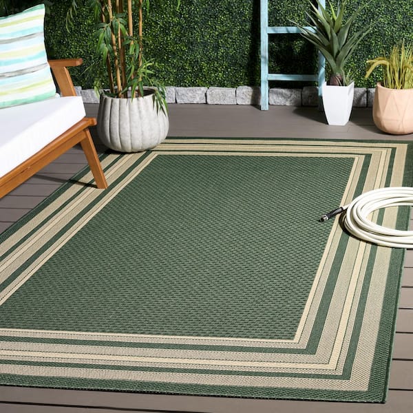 Courtyard 7 x 10 Dark Green/Beige Border Area Rug