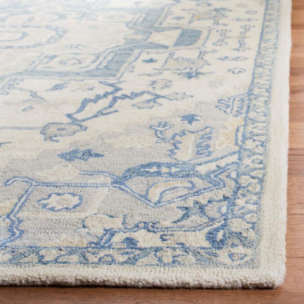 Ivory and Blue Handmade Wool Round Tufted Rug