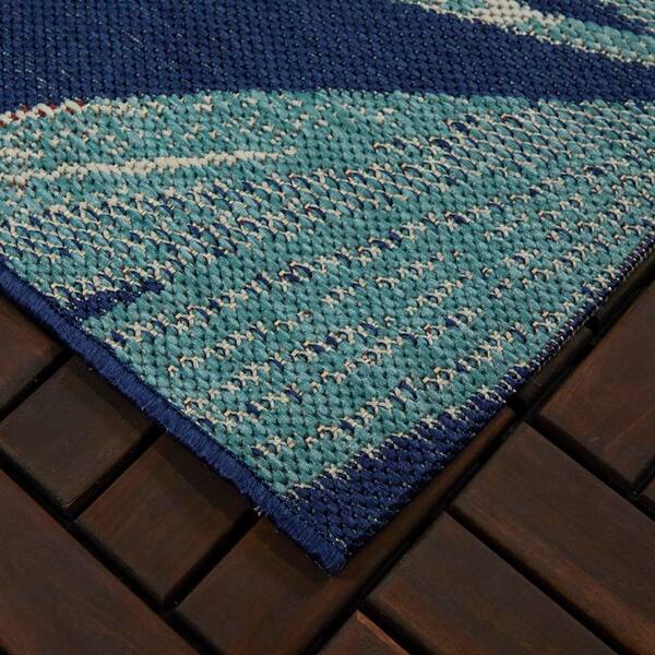 https://images.thdstatic.com/productImages/be1156ab-5c31-40fc-90c3-a3bdd496671e/svn/palm-with-blue-hue-hampton-bay-outdoor-rugs-3018219-a0_600.jpg