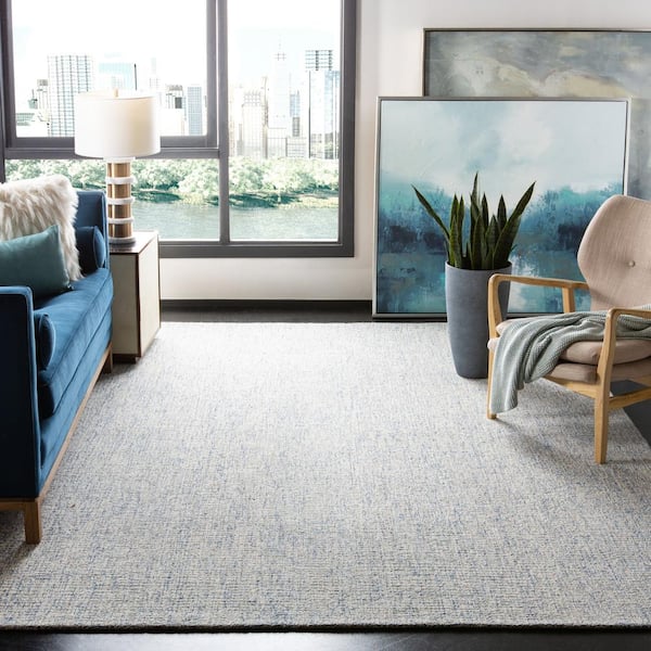 Abstract Ivory/Blue 10 ft. x 14 ft. Geometric Speckled Area Rug