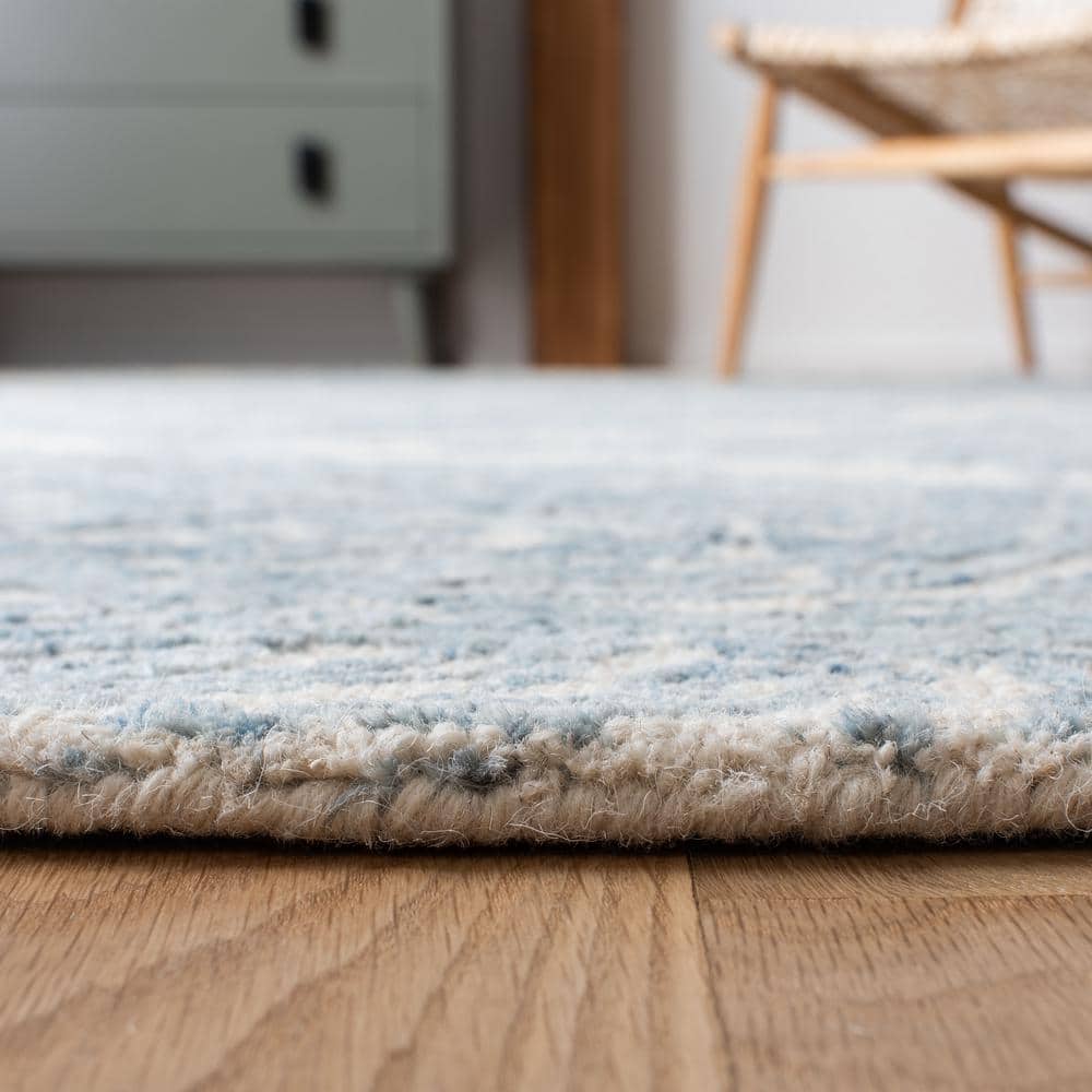 Ivory and Blue Handmade Tufted Wool Abstract Rug