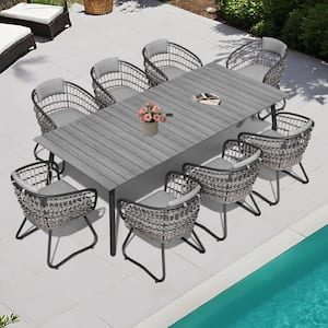 9-Piece Aluminum Wicker Outdoor Dining Set with Gray Cushion and Umbrella Hole