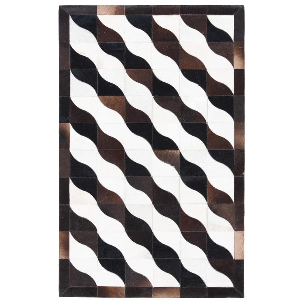 Handmade Black Geometric Cowhide Area Rug