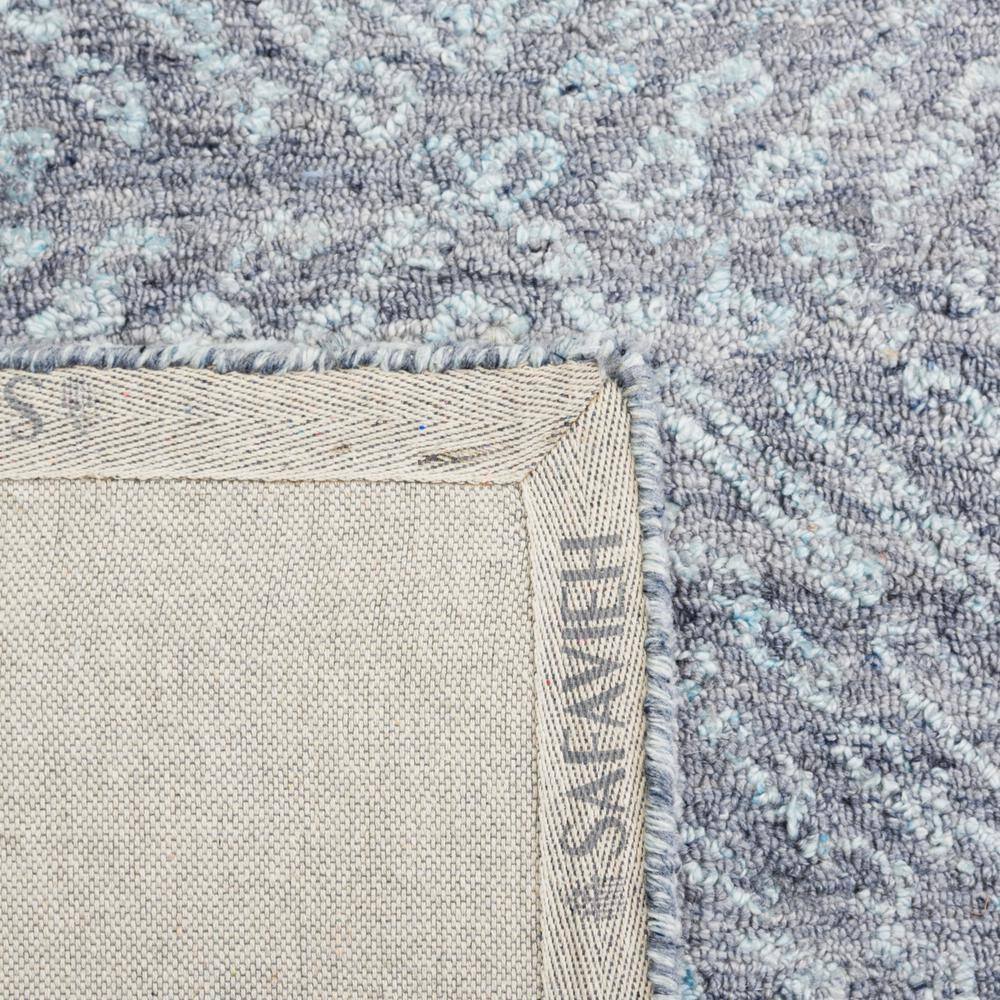 Handmade Blue Abstract Tufted Wool Rectangular Rug 27" x 4"