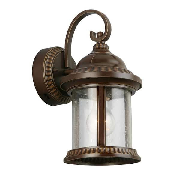 Cambridge Adjustable Wall Light in an Antique Brass Finish with