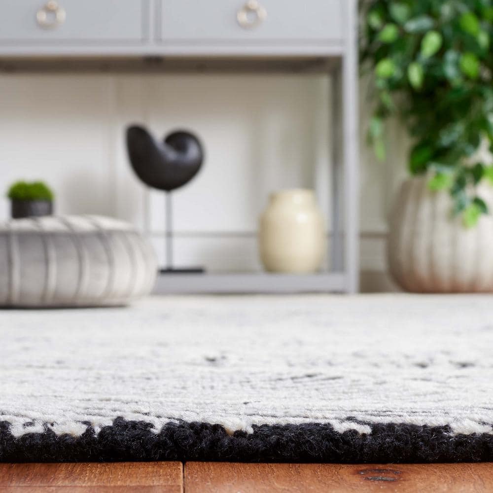 Ebony Black and Ivory Hand Tufted Wool Area Rug