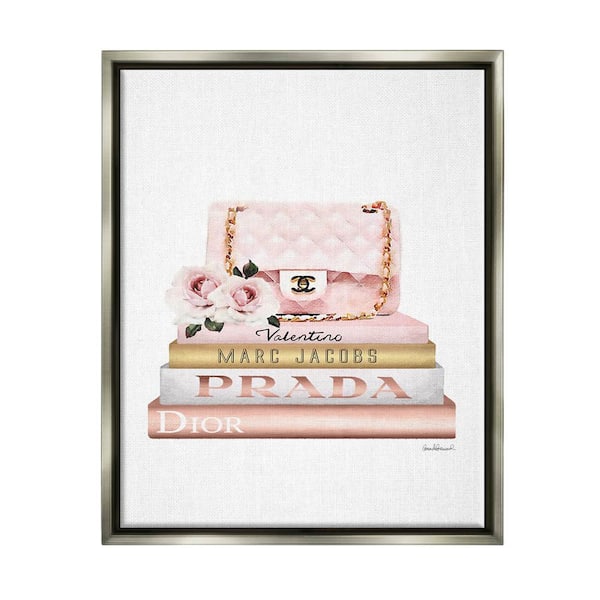 The Stupell Home Decor Collection Pink Purse Gold Bookstack Glam Watercolor Design by Amanda Greenwood Floater Frame Nature Wall Art Print 21 in. x 17 in.
