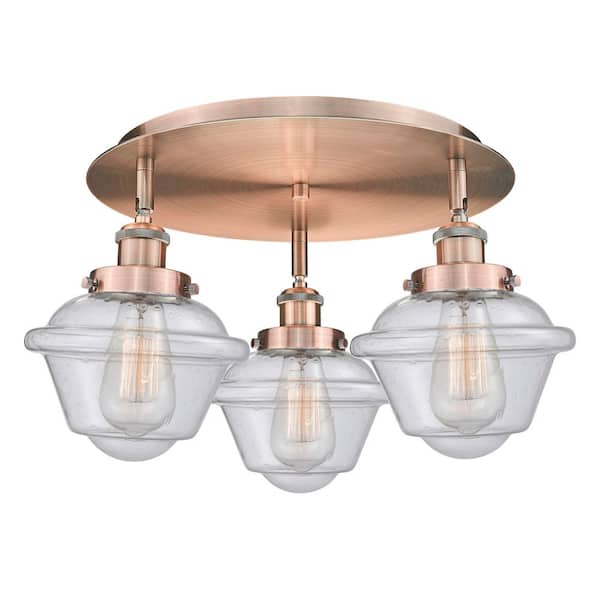 Oxford 18.25 in. 3-Light Antique Copper Art Nouveau Flush Mount with Seeded Glass Shade