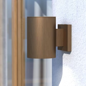 Chiasso 7.25 in. H Warm Brass Outdoor Mid Century Modern 1-Light Outdoor Cylinder Wall Sconce, Dark Sky