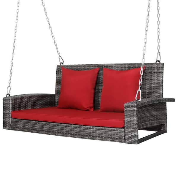 Costway 42.5 in. 2-Person PE Wicker Hanging Porch Patio Swing Bench Chair with Red Cushion