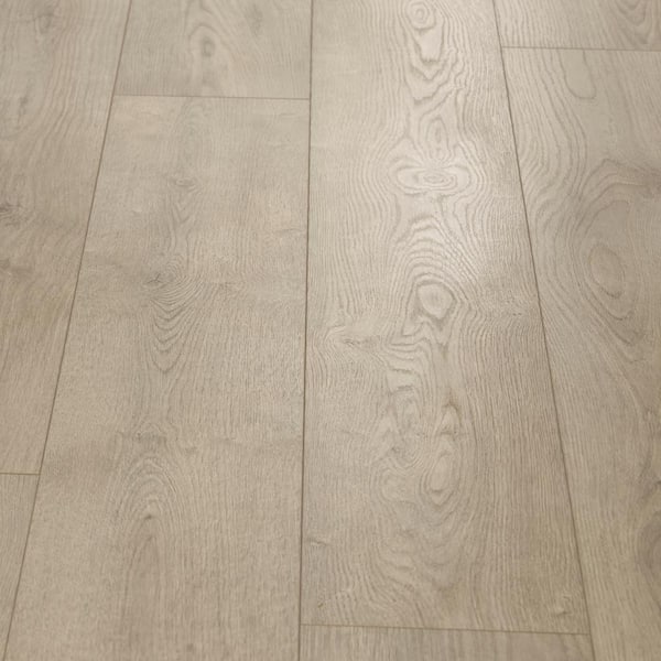 TrafficMaster Oak Knoll 8 mm T x 7.5 in. W Water Resistant Laminate Wood Flooring (23.7 sqft/case)