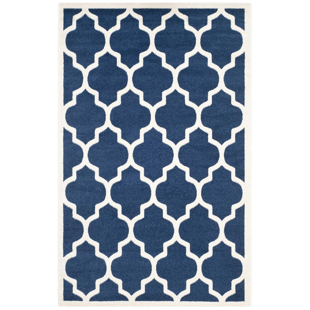 Reversible Geometric Navy and Beige 5' x 8' Synthetic Area Rug