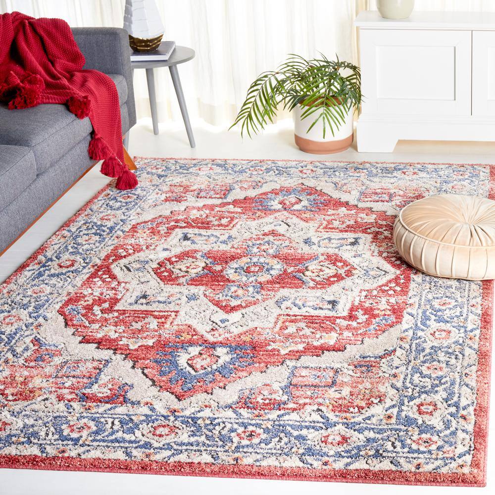 Luna 4'5" x 6'5" Blue and Rust Synthetic Area Rug
