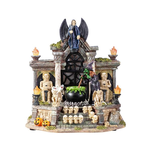 Glitzhome 9.75 in. H Lighted Resin Halloween Haunted House Village