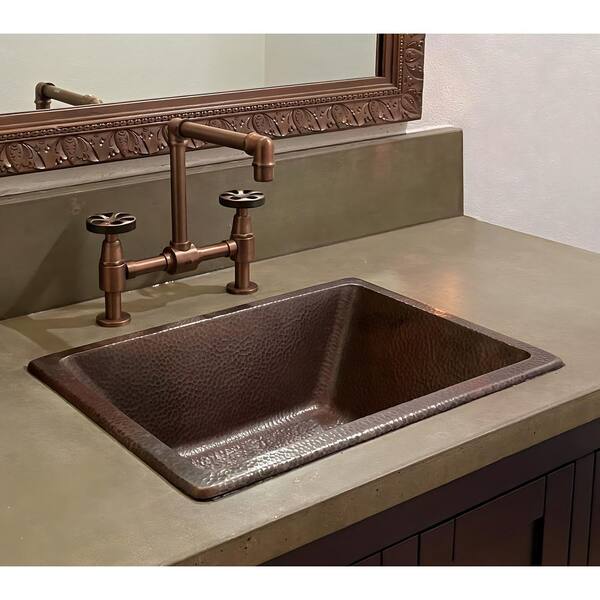 https://images.thdstatic.com/productImages/bf08ba98-49ca-45f8-a460-5aa7cde0a1b5/svn/aged-copper-sinkology-undermount-bathroom-sinks-sb205-17ag-e1_600.jpg