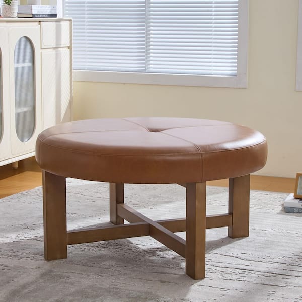 Elton Modern Light Brown and Walnut Upholstered Faux Leather Round Tufted Accent Ottoman with Wood Cross Base