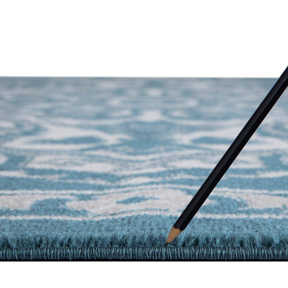 Blue and Ivory Medallion Synthetic 5' x 7' Area Rug