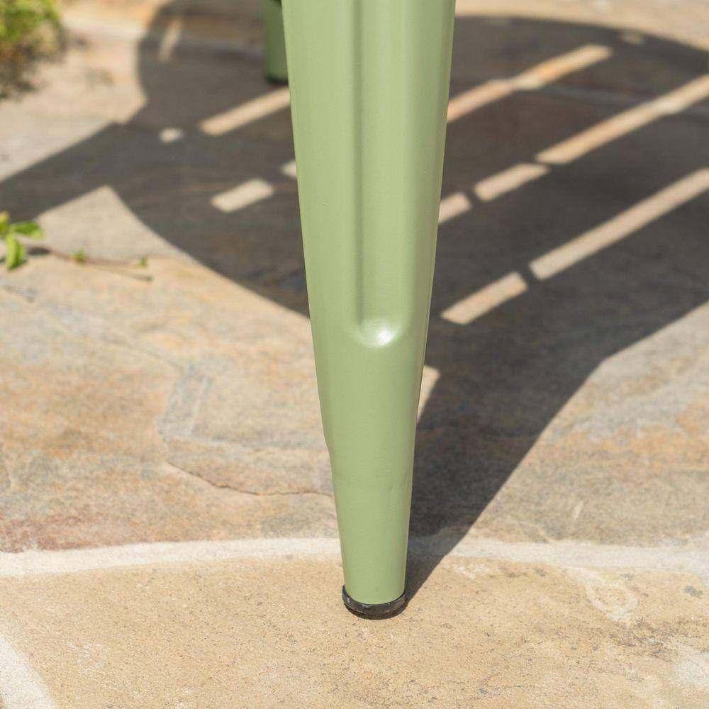Close-up detail of the metal leg structure of the bistro set.