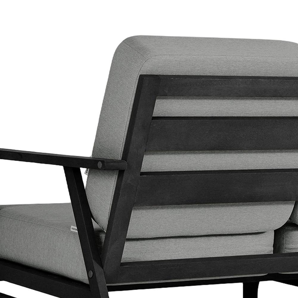 Close-up of the backrest and wooden frame structure of an outdoor sofa.