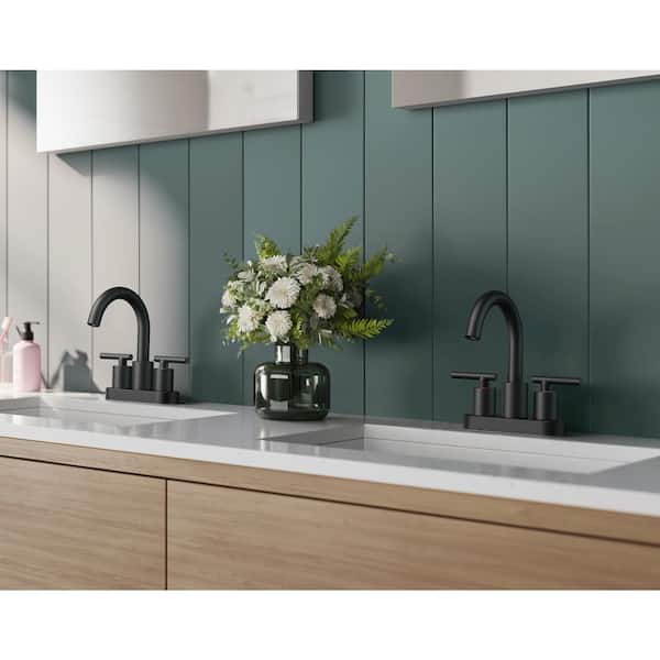 4 in. Centerset Double Handle Low Arc Bathroom Faucet with Pop-Up Drain Included in Matte Black