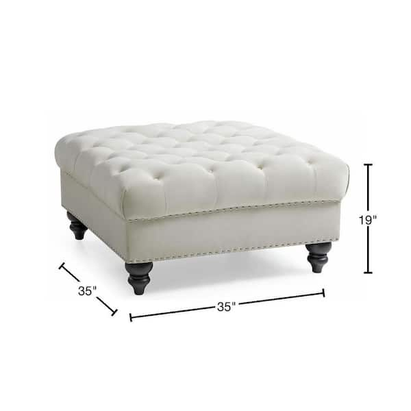 Ivory tufted store ottoman