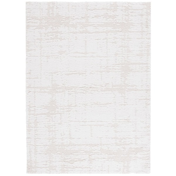 Rumi Shag 9 ft. x 12 ft. Ivory/Light Beige Distressed Solid Area Rug