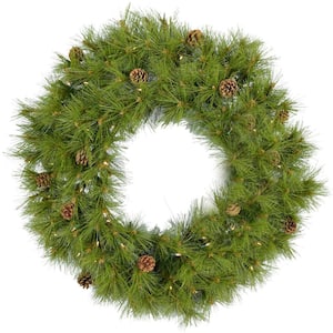 48 in. Eastern Pine Artificial Holiday Wreath with Clear Battery-Operated LED String Lights