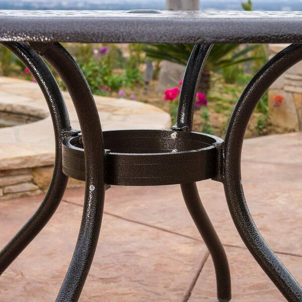 noble house phoenix hammered bronze round aluminum outdoor dining table