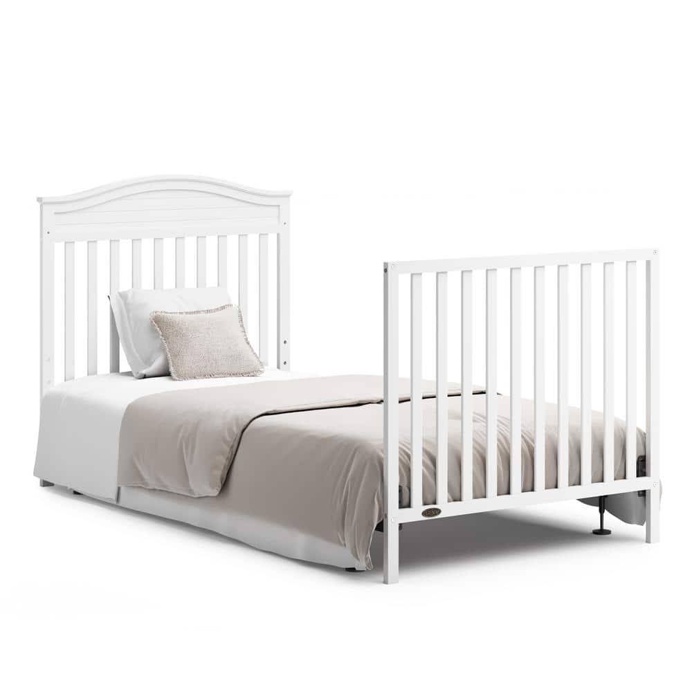 Stella White Pine Wood 4-in-1 Convertible Mini Crib with Foam Mattress
