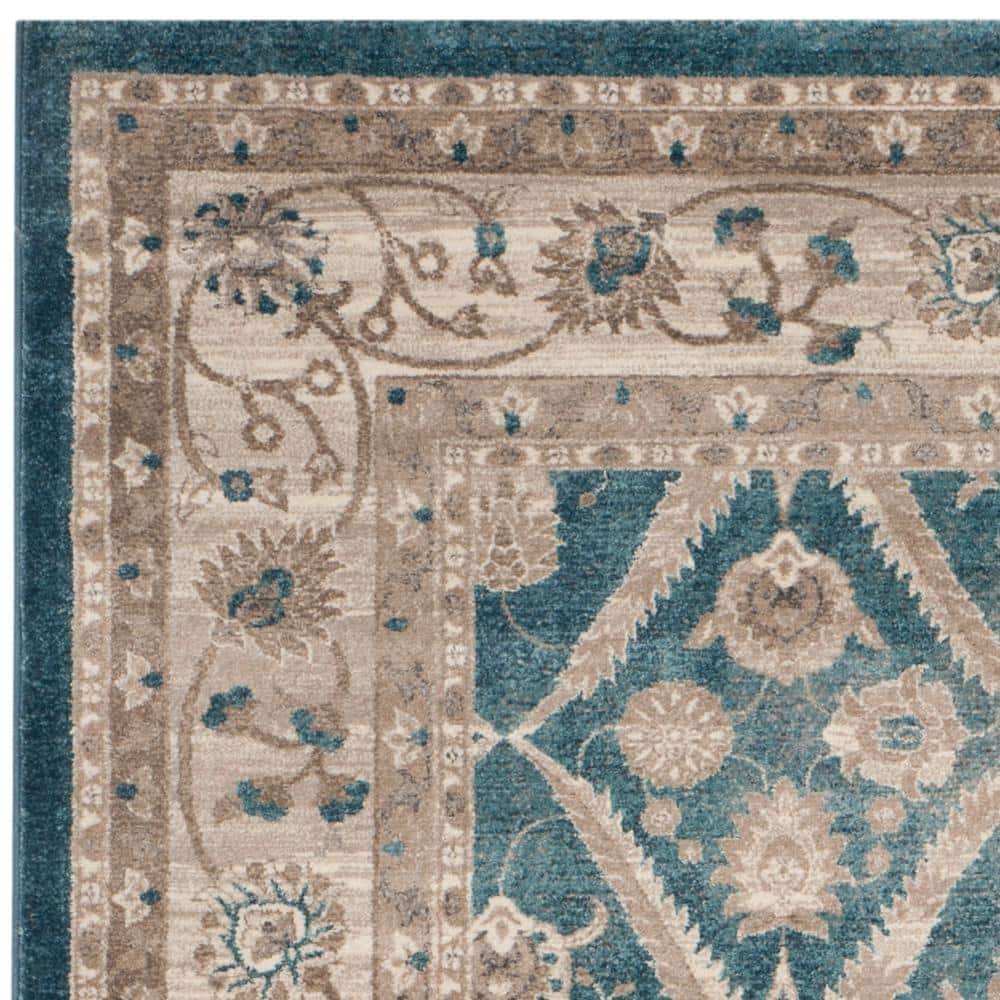 Navy and Beige Floral Border Synthetic Area Rug 8' x 10'