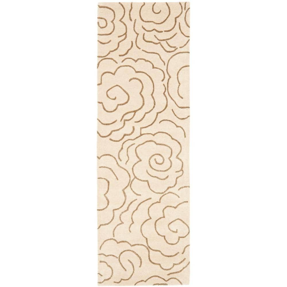 https://images.thdstatic.com/productImages/bf7ece81-354c-4fb9-b3b2-2a40fa6499e3/svn/beige-multi-safavieh-area-rugs-soh812e-28-64_1000.jpg