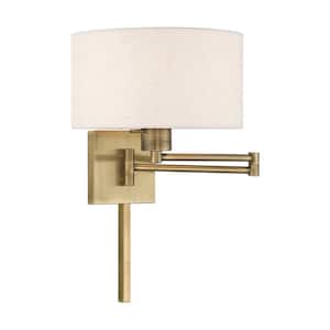 Atwood 1-Light Antique Brass Plug-In/Hardwired Swing Arm Wall Lamp with Oatmeal Fabrick Shade