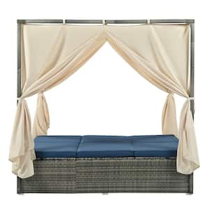 Wicker Outdoor Day Bed with Blue Cushions and Curtain