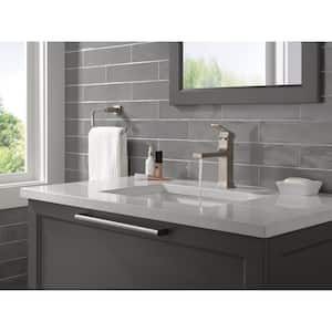 Velum Single Handle Single Hole Bathroom Faucet with Deckplate Included and Drain Kit Included in Stainless
