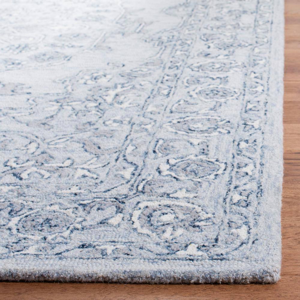 Handmade Light Blue/Ivory Tufted Wool 5' x 8' Area Rug