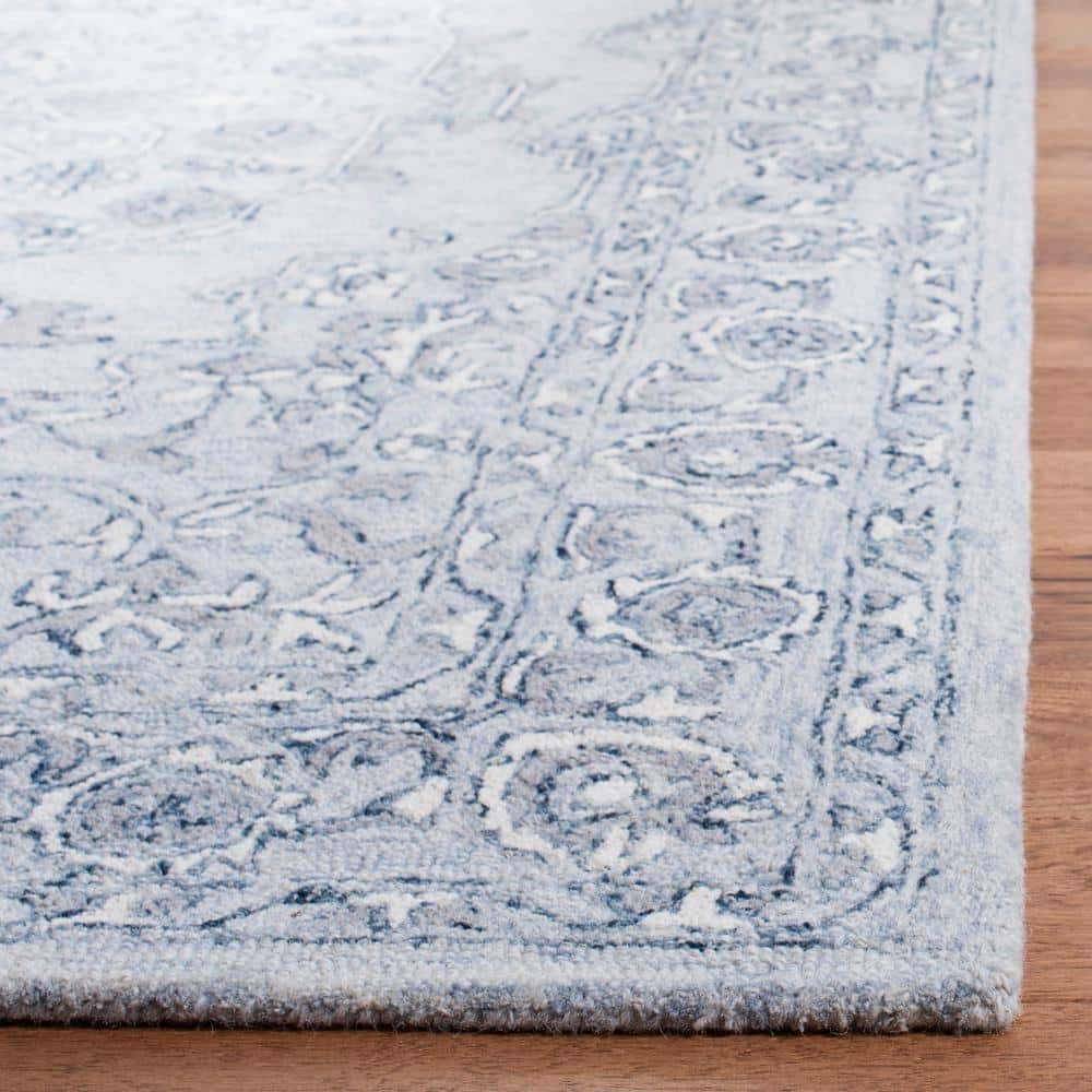 Handmade Tufted Wool Area Rug 9' x 12' in Light Blue and Ivory