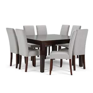 Acadian Transitional 9-Piece Dining Set w/8 Upholstered Parson Chairs in Cloud Grey Linen Look Fabric & 54 in. W Table