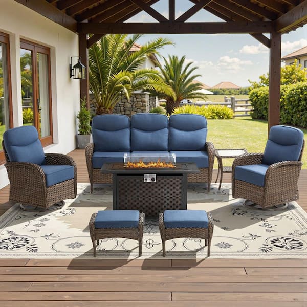 High Crescent 7-Piece Brown Wicker Patio Conversation Set with Blue Cushions and Steel Fire Pit Table