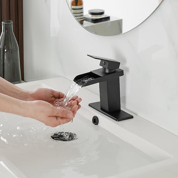 Waterfall Single Hole Single-Handle Low-Arc Bathroom Faucet With Pop-up Drain Assembly in Matte Black