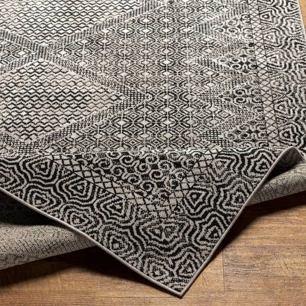 https://images.thdstatic.com/productImages/bfd3e4f8-81fd-4b11-885e-2f79f04fe511/svn/charcoal-grey-artistic-weavers-area-rugs-s00161053069-1f_600.jpg